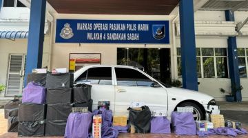 RAMPAS: Semua barang rampasan termasuk kenderaan dibawa ke Markas Operasi PPM Sandakan untuk tindakan lanjut.