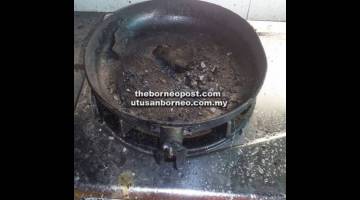 TERBAKAR: Periuk memasak terbakar dalam kejadian di Taman Limpaki semalam.