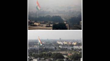 TAHAP BERBAHAYA: Gambar kombinasi menunjukkan bangunan diselubungi jerebu di New Delhi, India semalam (atas) dan di tempat yang sama kelmarin. — Gambar Reuters