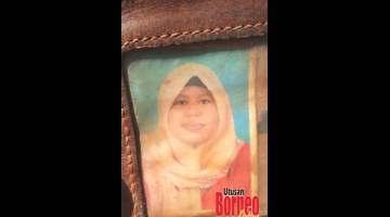 DICARI: Gambar wanita yang berada di dalam dompet mangsa.